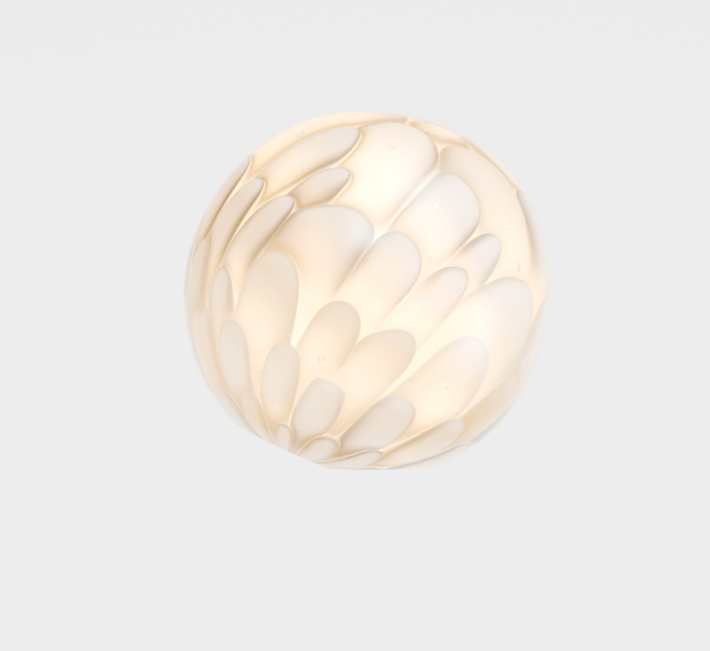 Bocci petal glass pendant lit from within, warm glow through layered glass petals