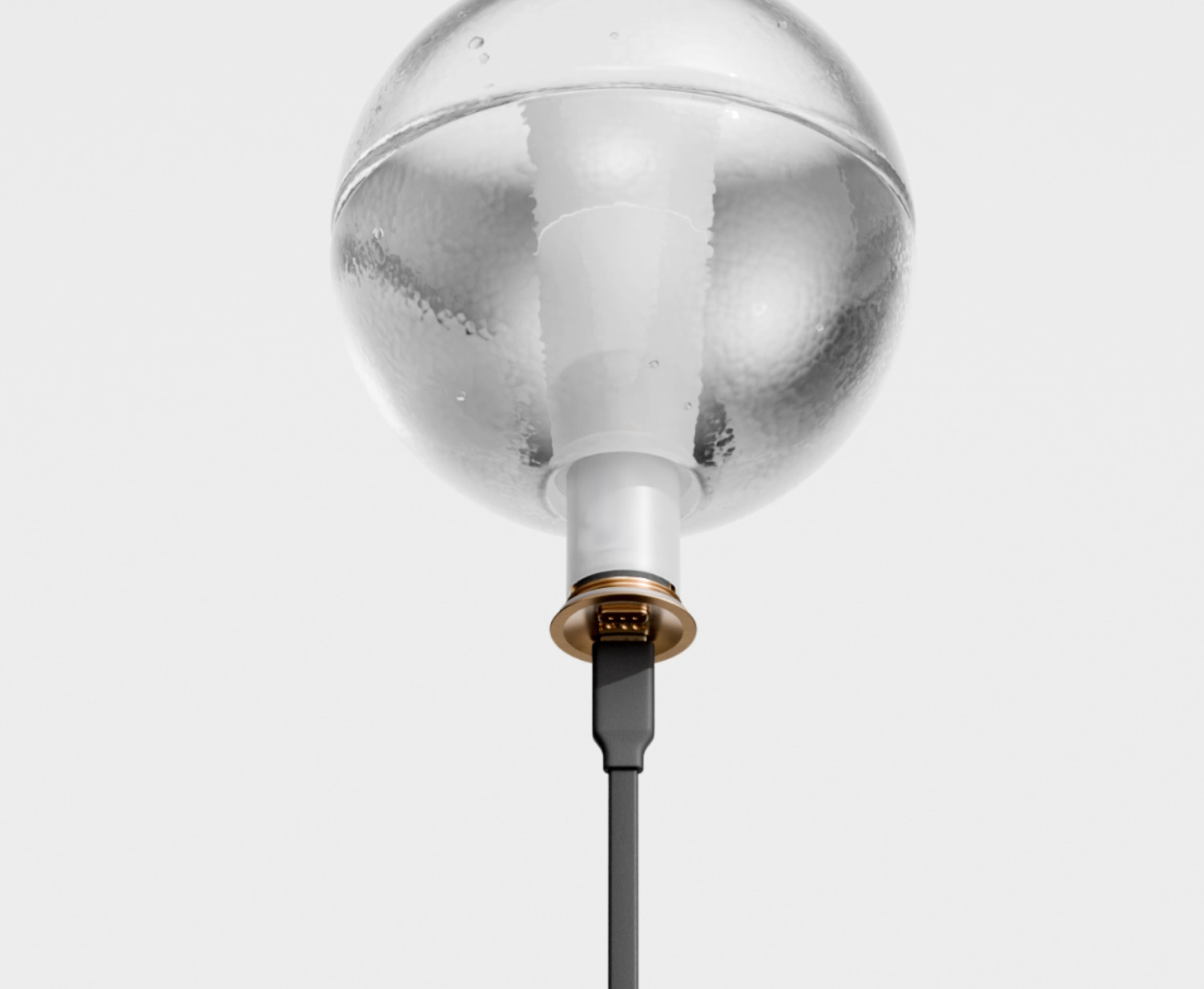 Clear hammered glass Bocci pendant with brass port and connected cable